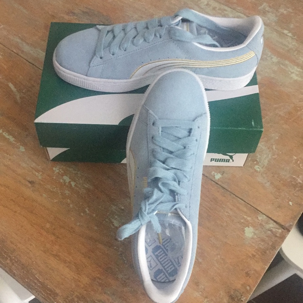 Brand new baby blue and gold suede puma’s
